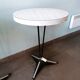 Pair of round vintage bistro tables, pedestal table
