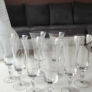 Set of 8 champagne flutes, flared neck. In crystal. Frosted plant motifs.