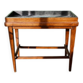 Work table, early 20th century, made of wood and riveted zinc.