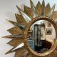 Golden sunburst mirror with wooden rays - 1950s