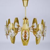 Oscar Torlasco brass chandelier of 25 inches with optical prism lenses, Italy, 1970s.