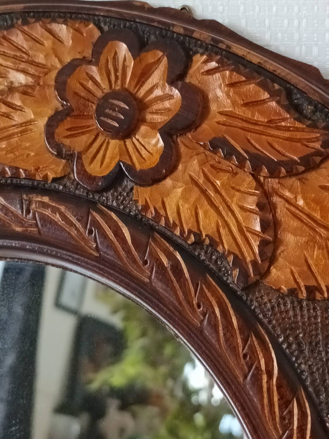 Round vintage carved wooden mirror