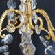 Paire d’appliques deux feux en bronze avec pampilles et guirlandes en cristal – Style Louis XV