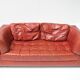 Vintage Osaka loveseat in oxblood leather by Natuzzi Italy