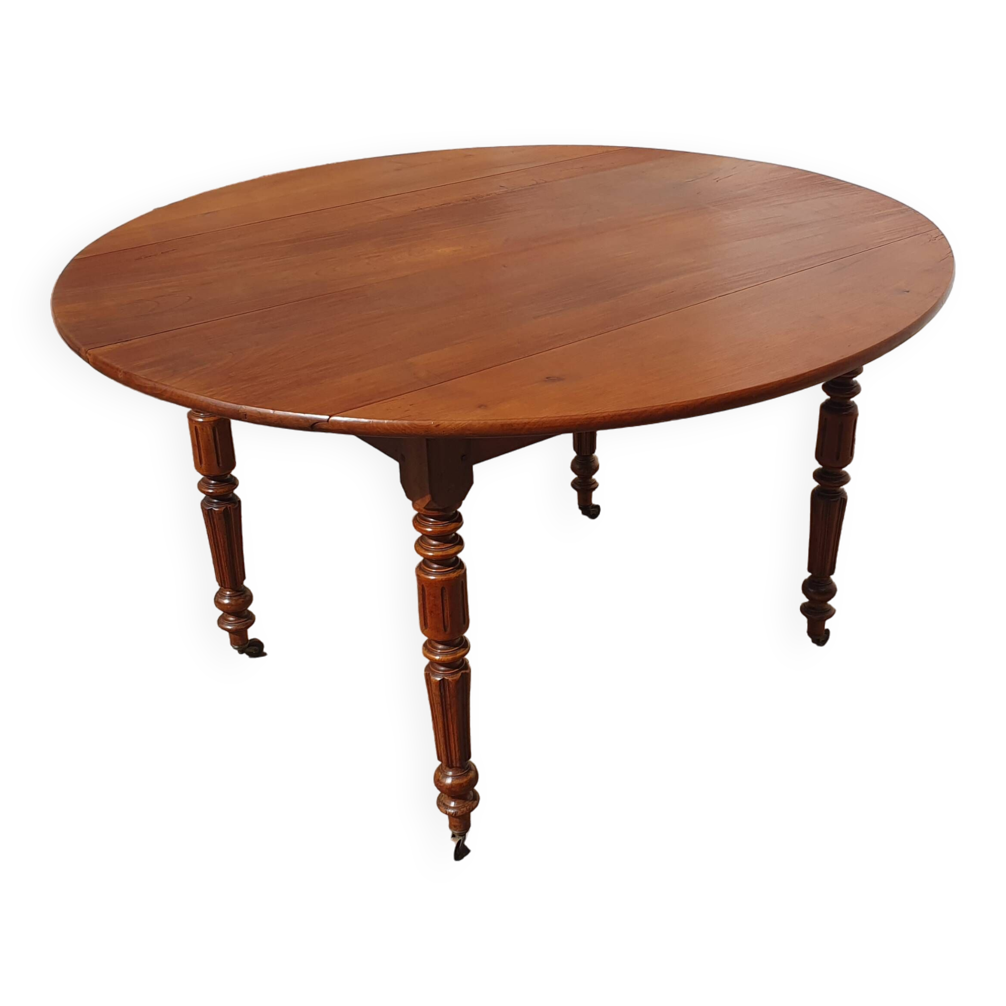 Table ronde ovale à abattants merisier massif époque XIX°