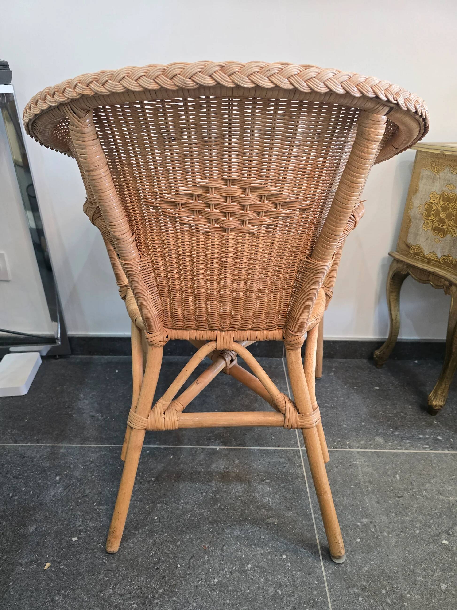 Pair of woven rattan armchairs – Vintage