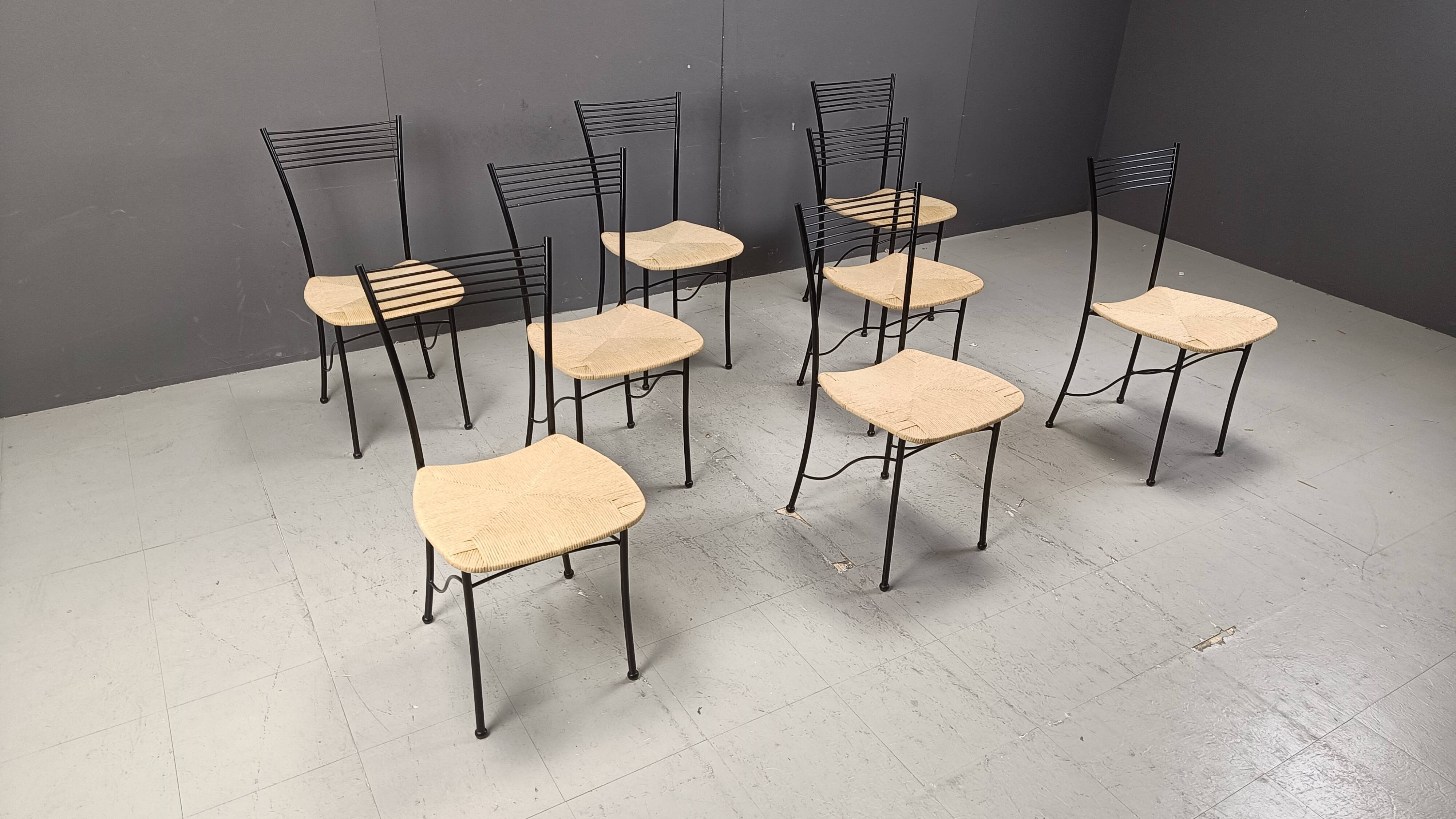 Vintage black metal and wicker italian bistro chairs.  Beautiful, elegant i