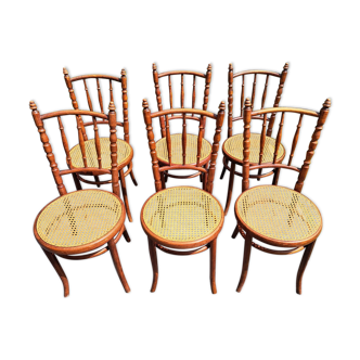Set of 6 Fischel canned wooden chairs