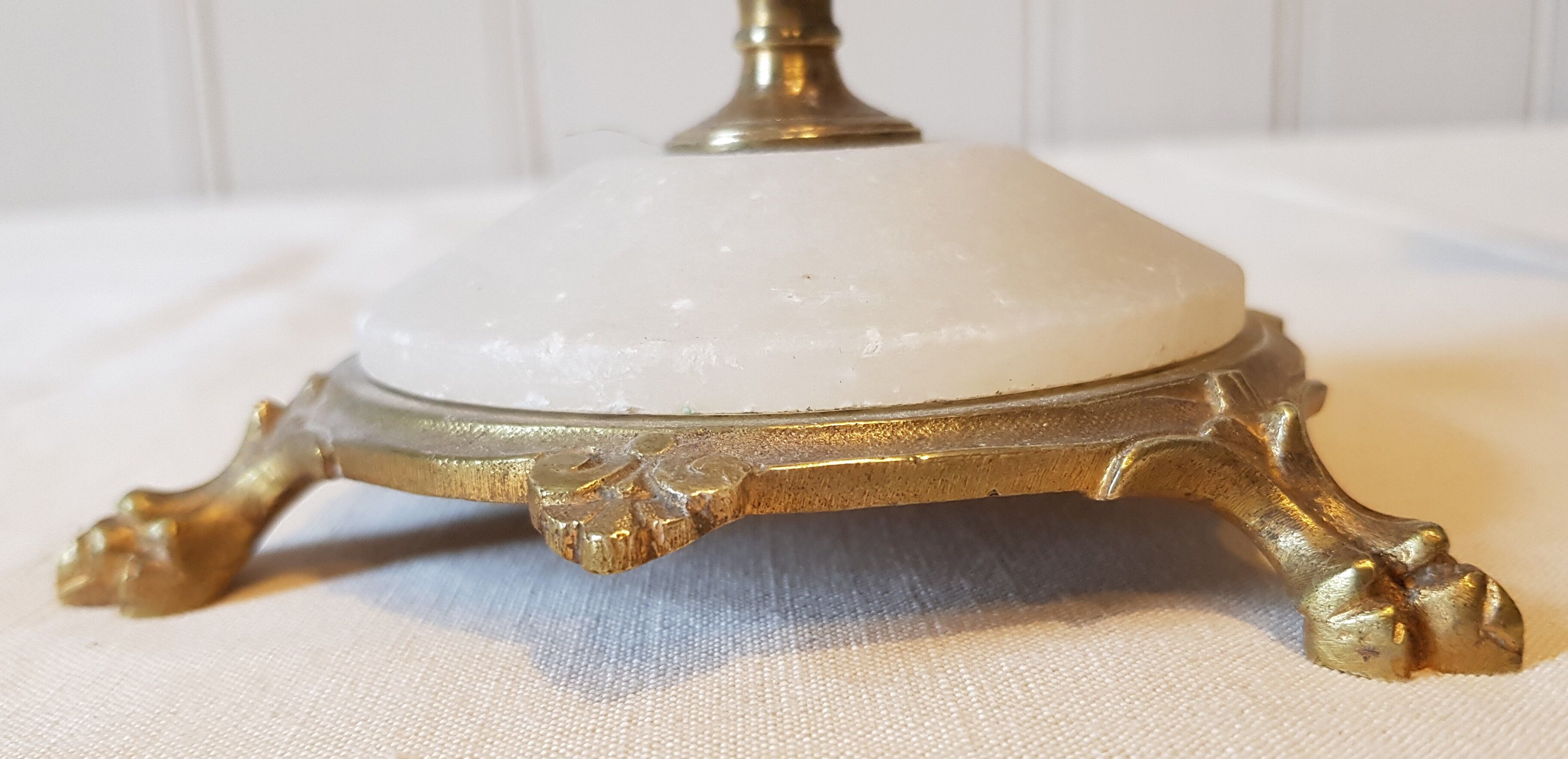 Pair of brass and alabaster candlesticks