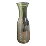 Old green milk bottle