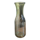 Old green milk bottle