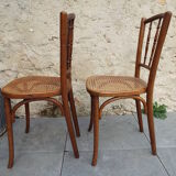 2 bistro chairs seated tanned