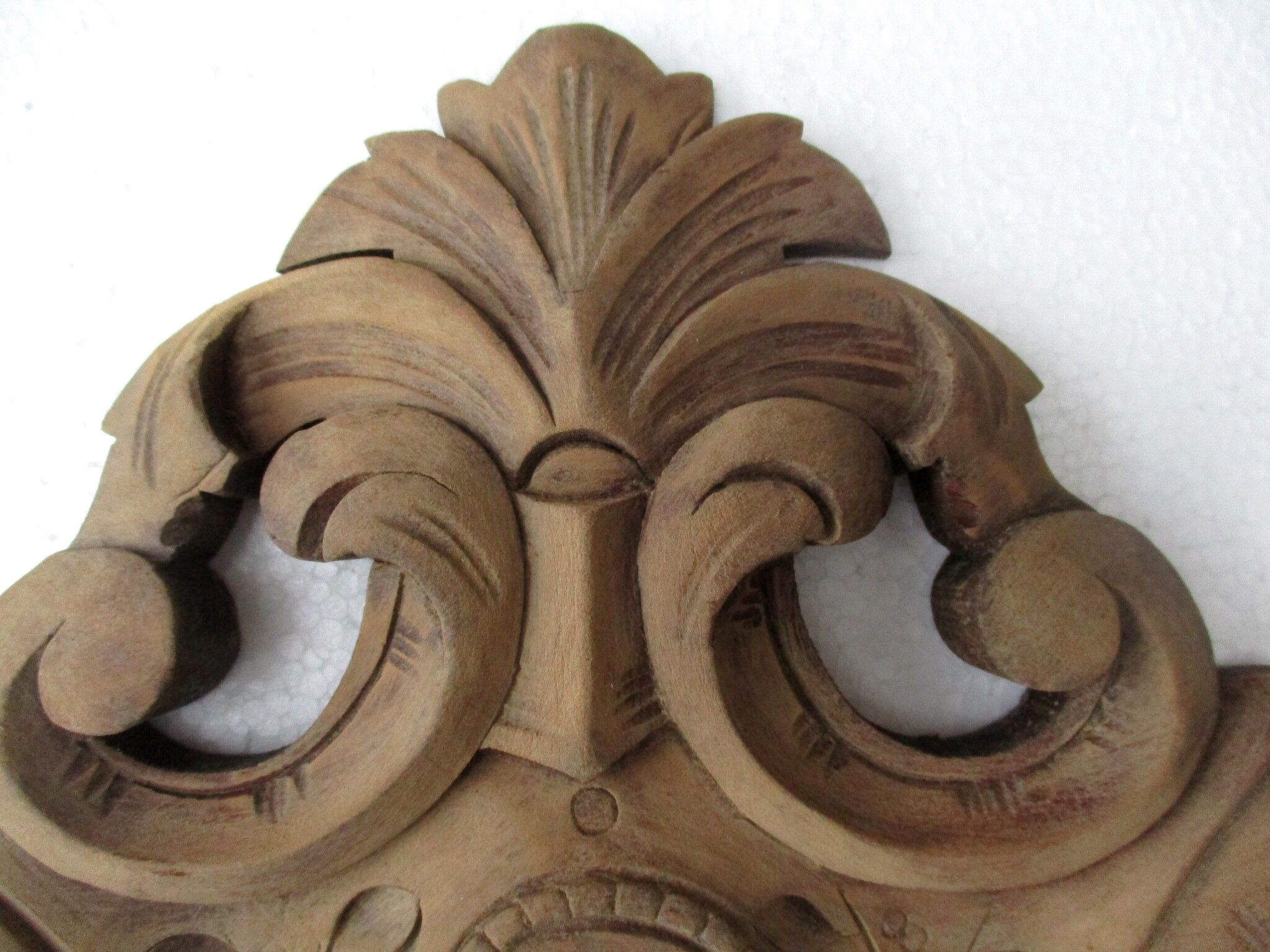 Carved wood pediment - cherry tree