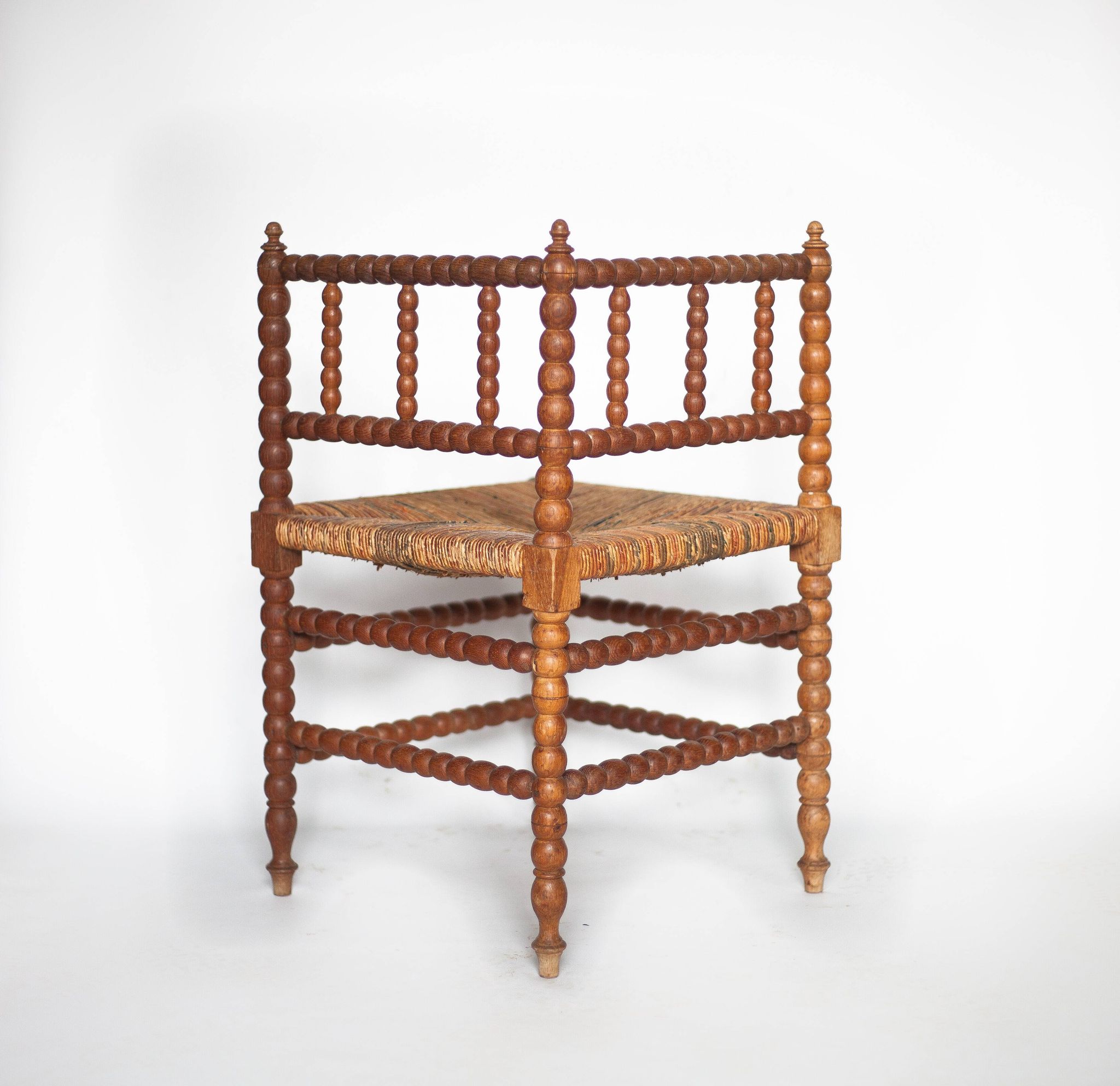 Wooden and caned corner chair, antique bobbin chair, occasional chair.