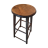 Top bar stool in patinated wooden seat round