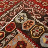 Kilim anatolien ancien tons rouges et beiges, motifs tribaux colorés
