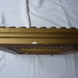 Gilded wood and stucco frame