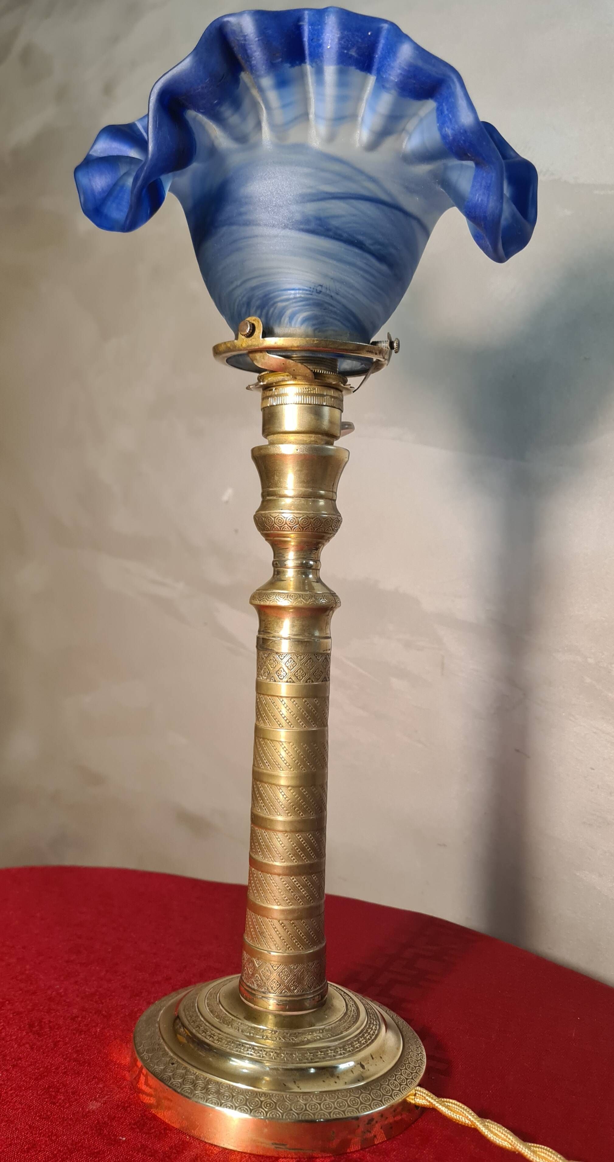etched brass lamp with a blue satin glass tulip shade, signed Vianne 36x16