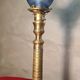 etched brass lamp with a blue satin glass tulip shade, signed Vianne 36x16