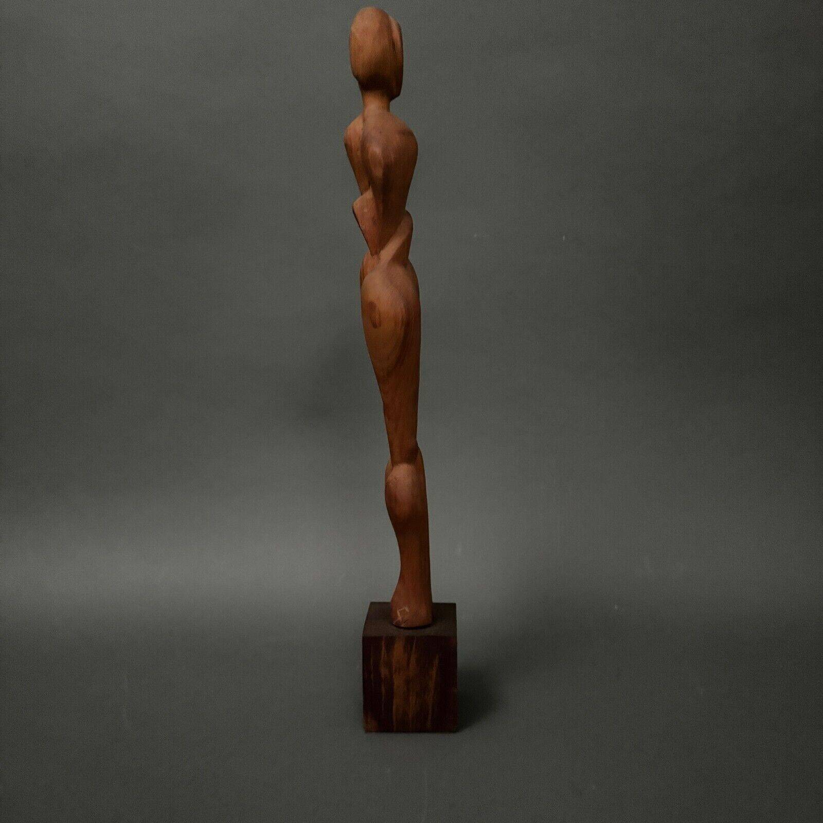 Carved wooden sculpture of a woman by Calin Hentea, 20th century
