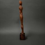 Carved wooden sculpture of a woman by Calin Hentea, 20th century