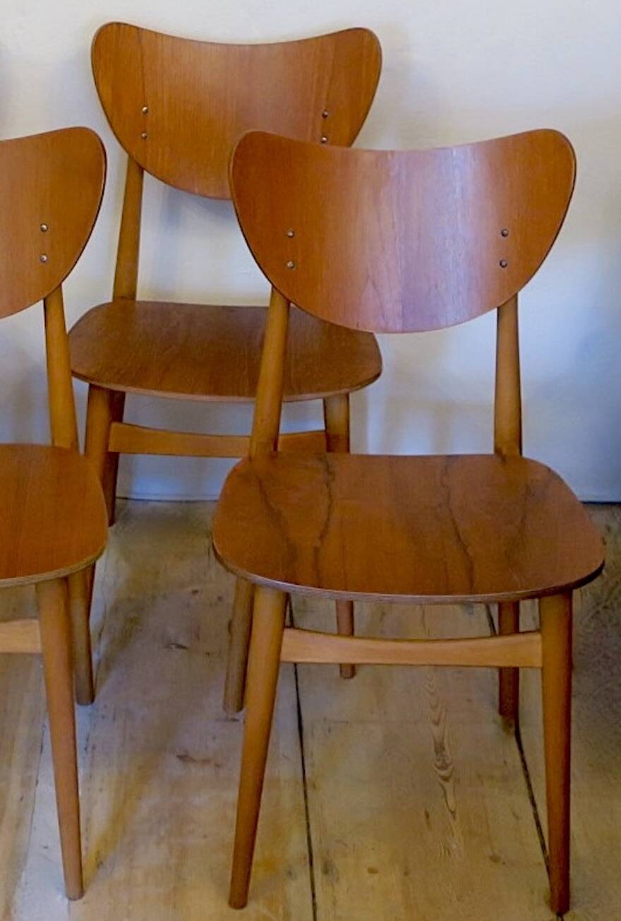 Set of 4 butterfly teak dining chairs with shaped backs, 1960s