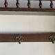 Antique wooden wall shelf with a turned gallery and 5 hooks L120 H40 D18