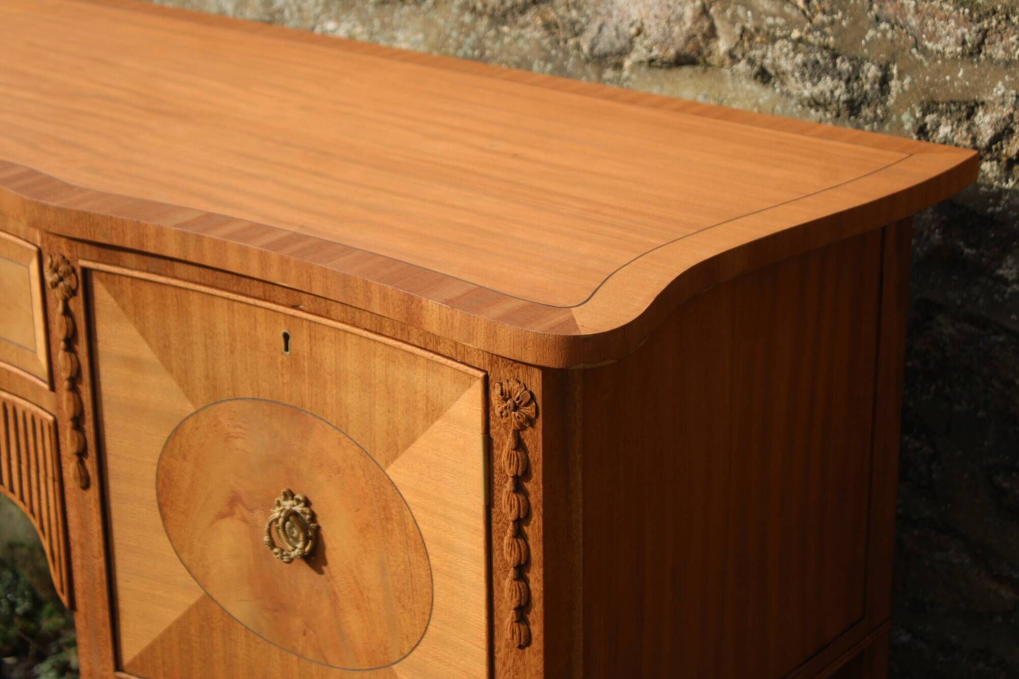 English-made enfilade in Louis XVI style with light wood veneers.