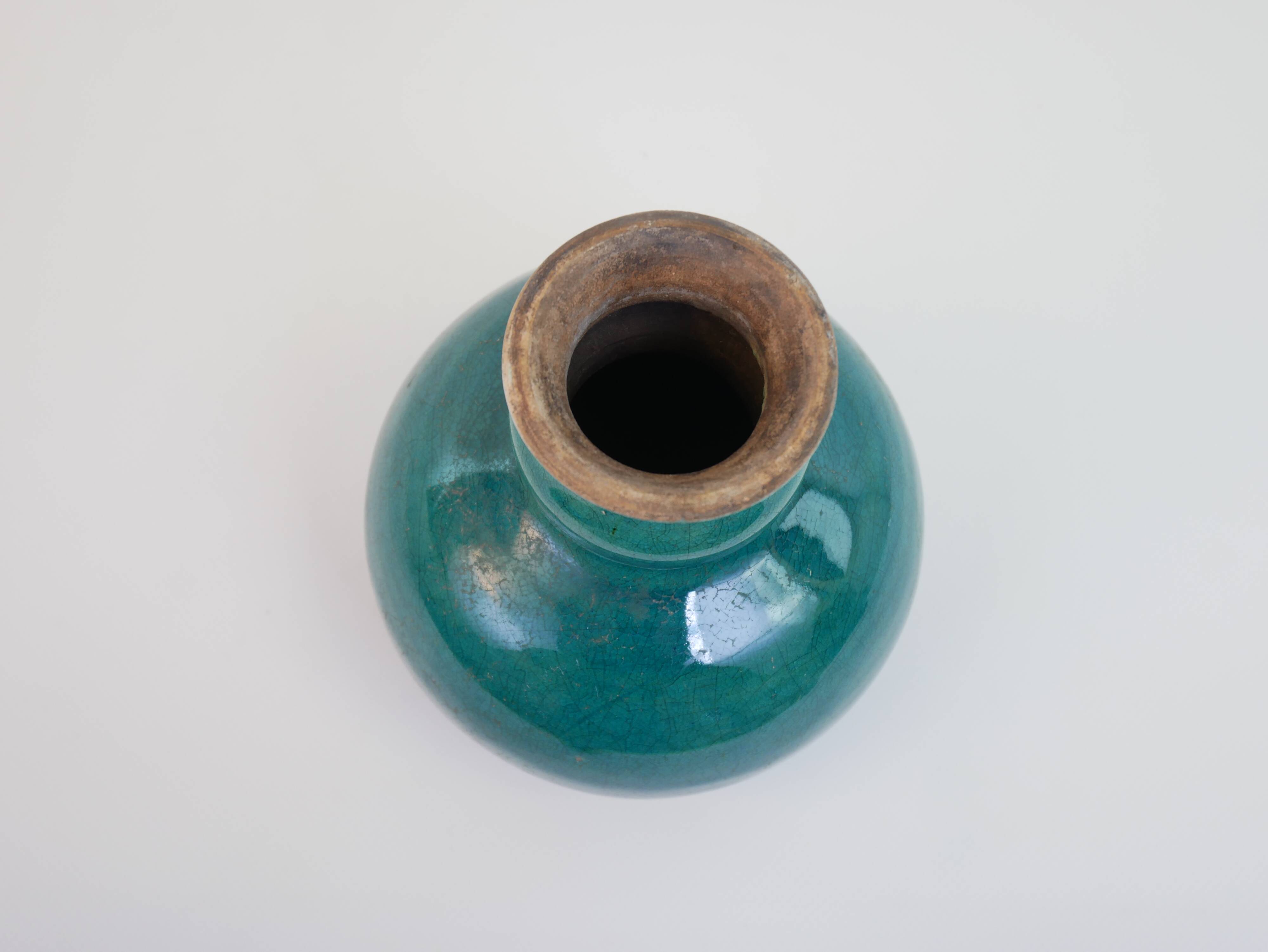 Small old blue ceramic vase