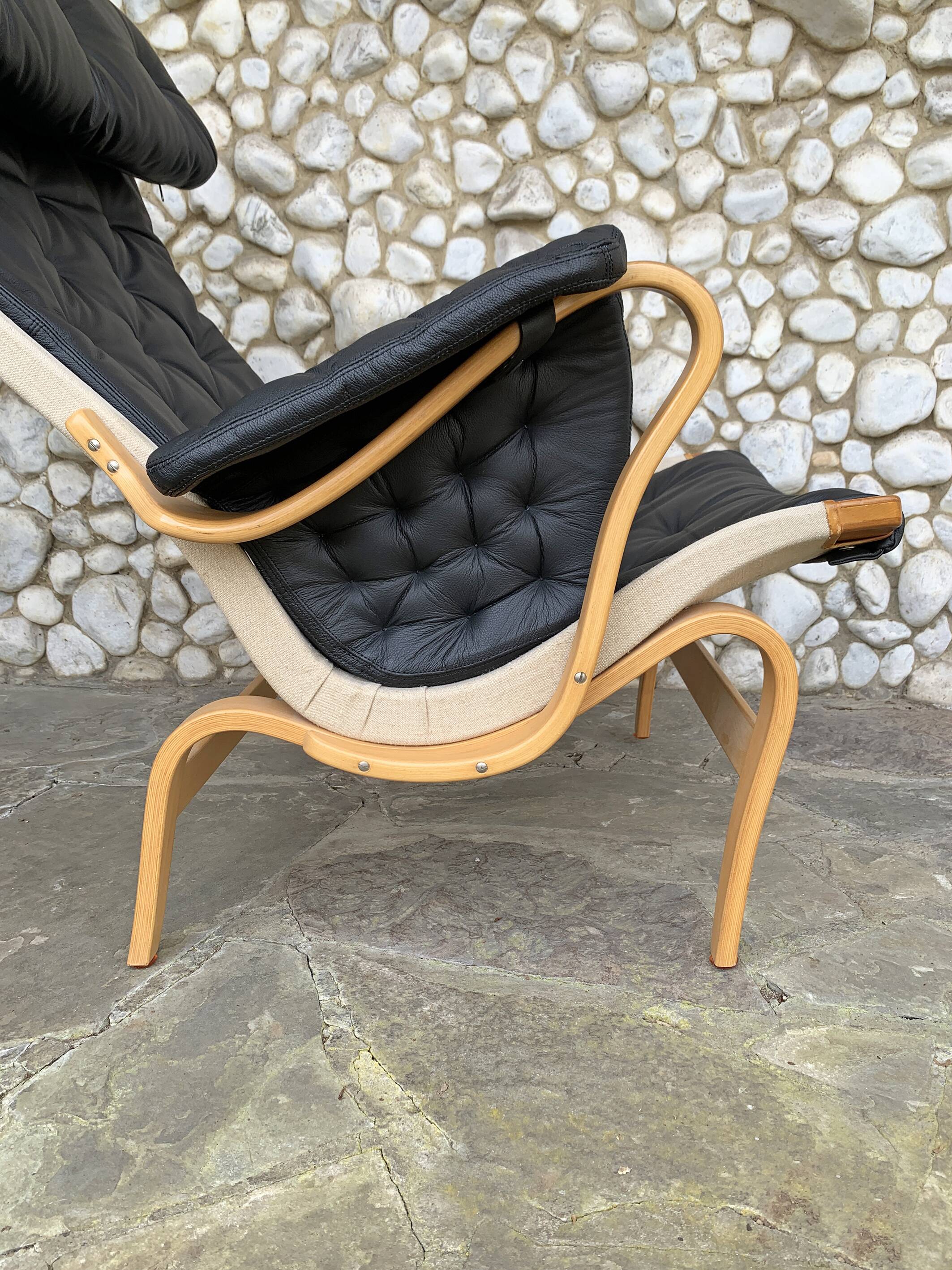 Pernilla armchair new black leather by Bruno Mathsson, Dux, Sweden 1970