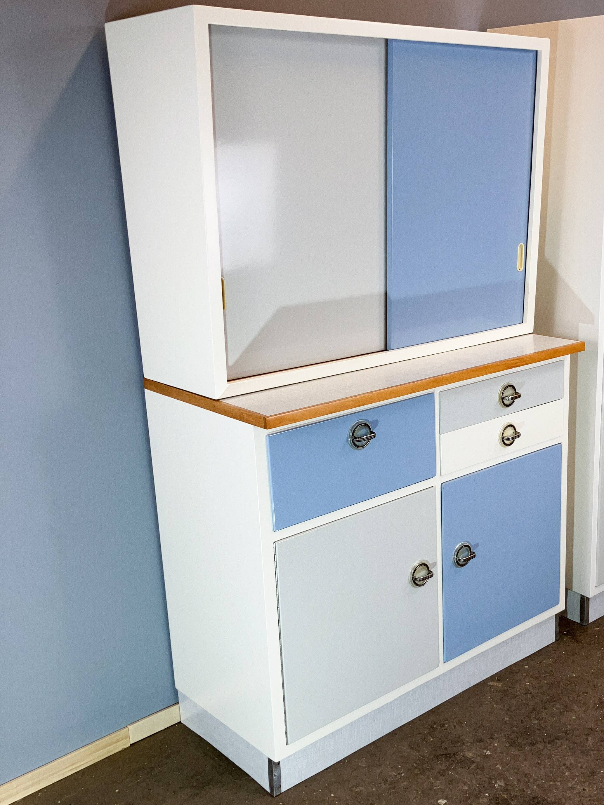Kitchen cabinets, pastel blue and light gray, vintage from the 60s