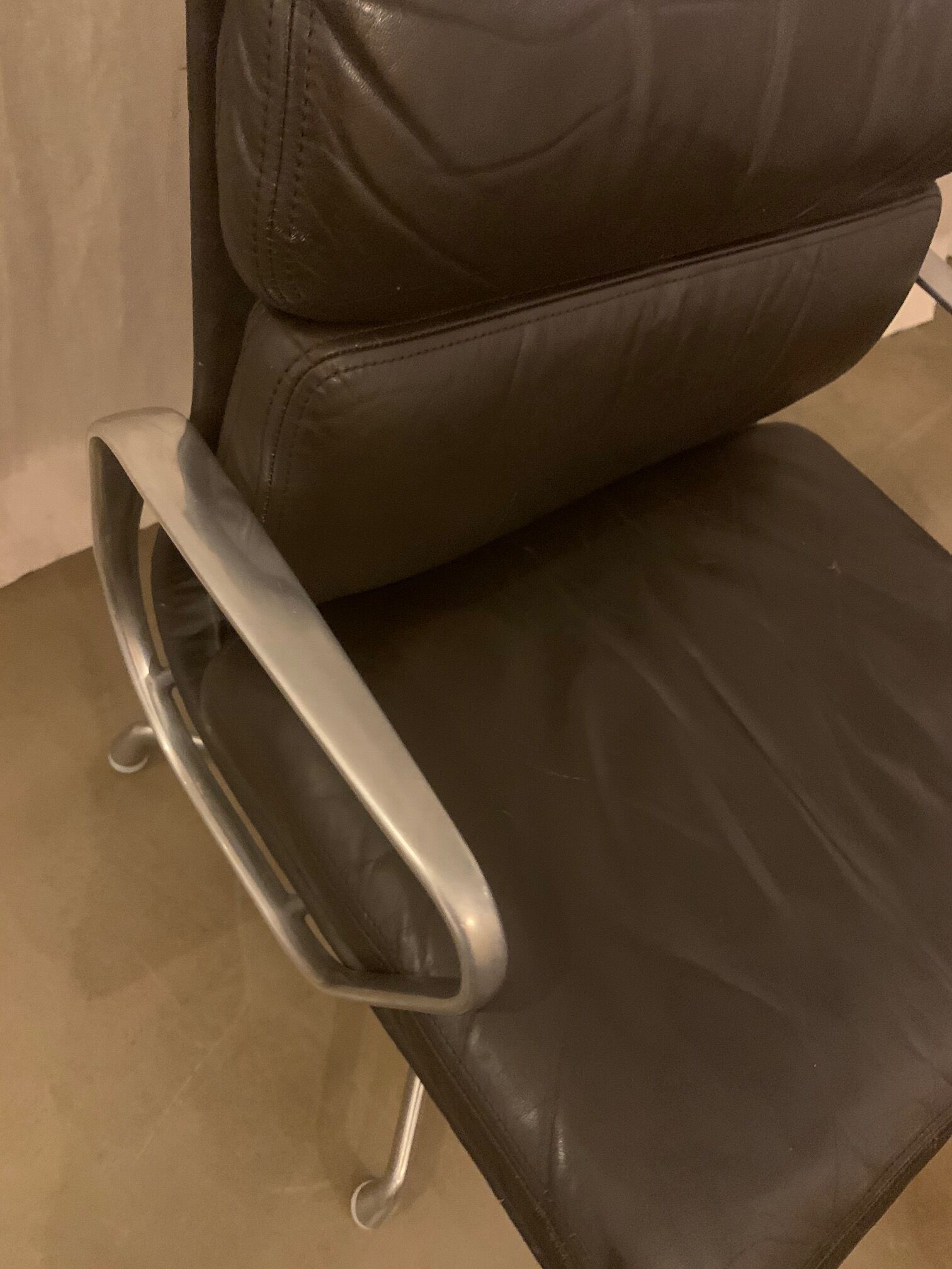 EA 208 brown leather armchair by Charles and Ray Eames for Herman Miller 1970S