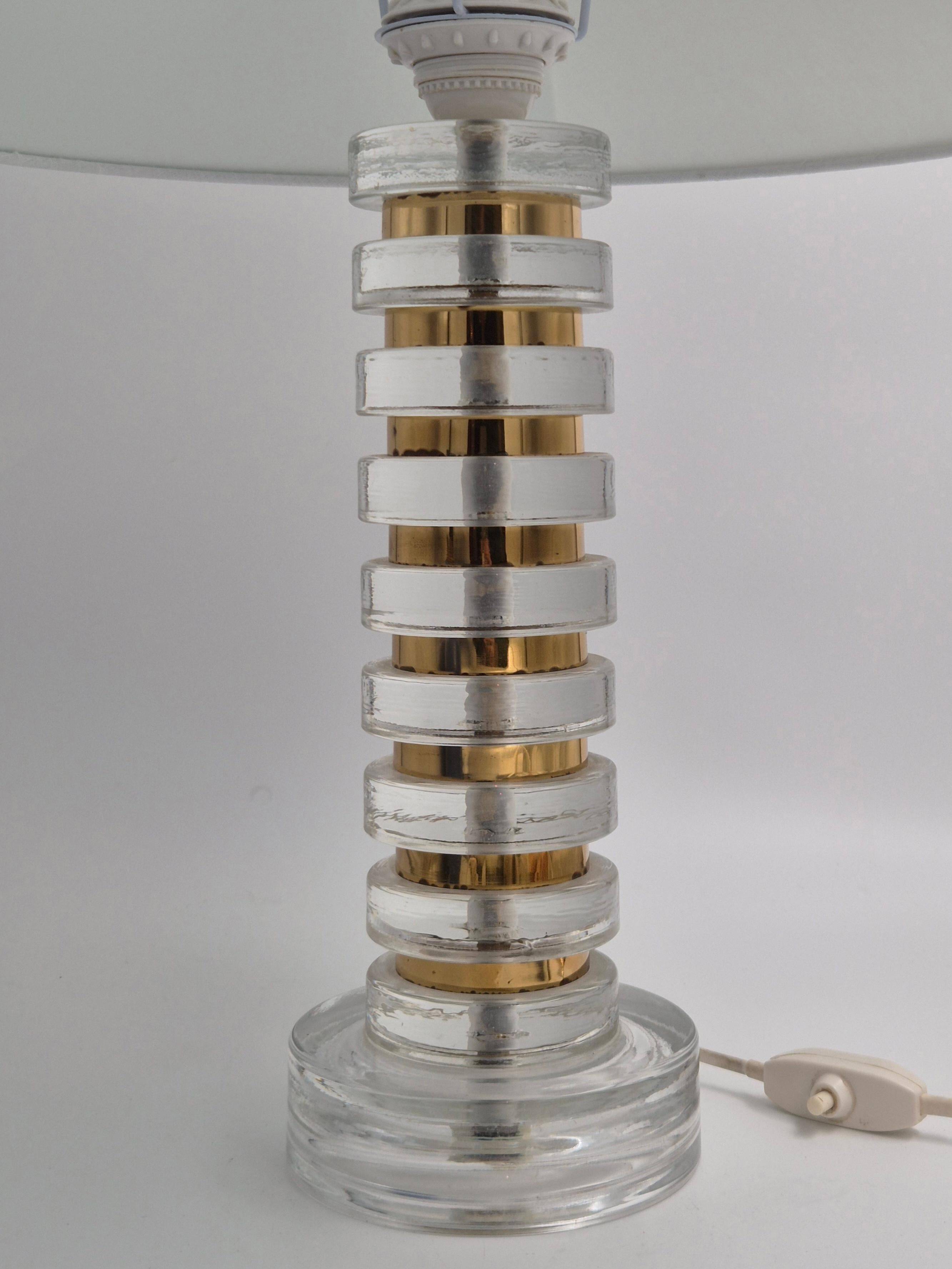 The Modern Scandinavian / Midcentury Modern table lamp with Orrefors glass and brass.