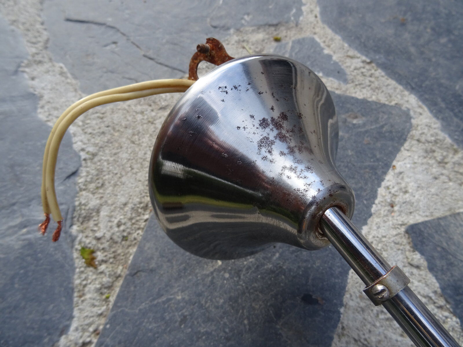 Hanging space age stainless steel