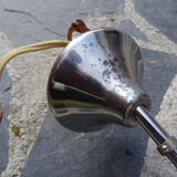 Hanging space age stainless steel