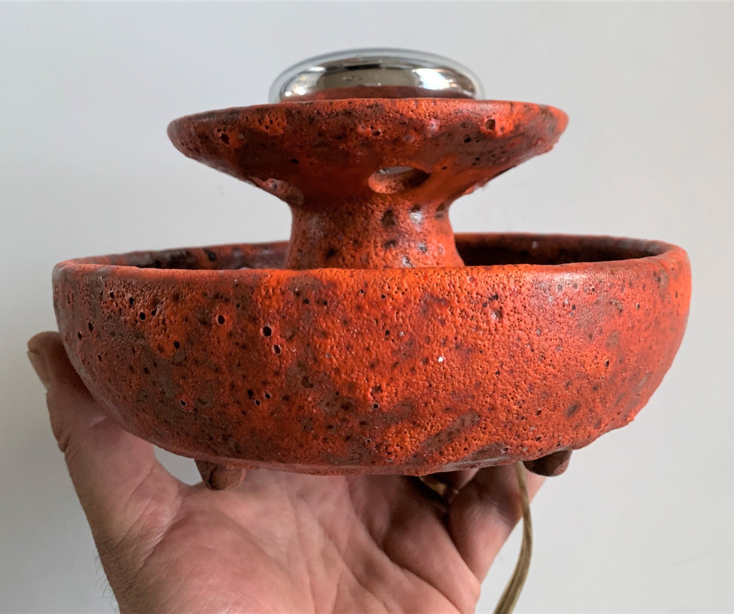 Ambient spot in orange glazed terracotta from the 1960s