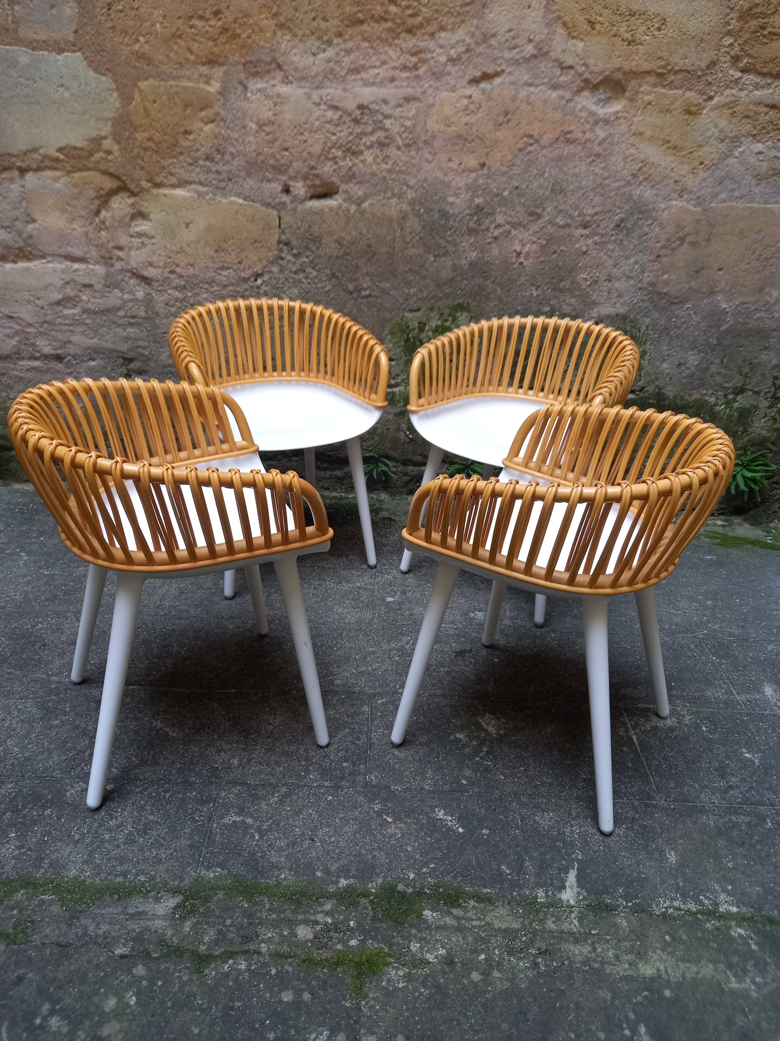 4 chairs, small armchairs, Cyborg club by Magis, designer Marcel Wanders, polycarbonate and wicker
