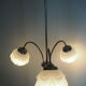 Suspension with 3 brass lights and a white glass globe from the 1950s-1960s.