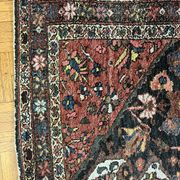 Antique handmade Hamadan Persian rug, ivory medallion on dark background 148x103.