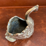 Empty pocket - bronze swan