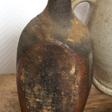 Bouteille en terre cuite ancienne