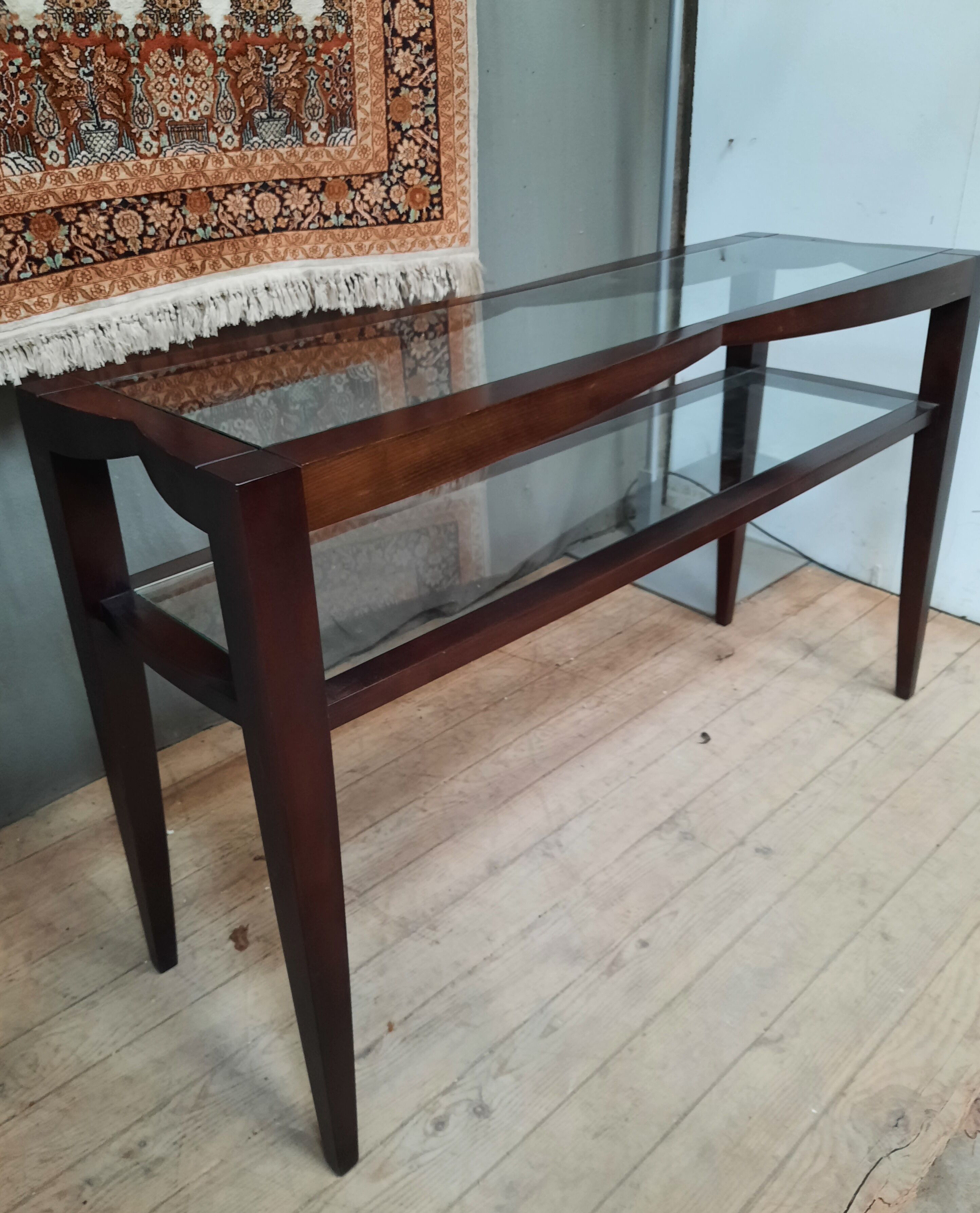 Contemporary console in varnished wood