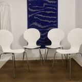 Set of 4 living room chairs in curved wood veneer and chrome base from the 70s.