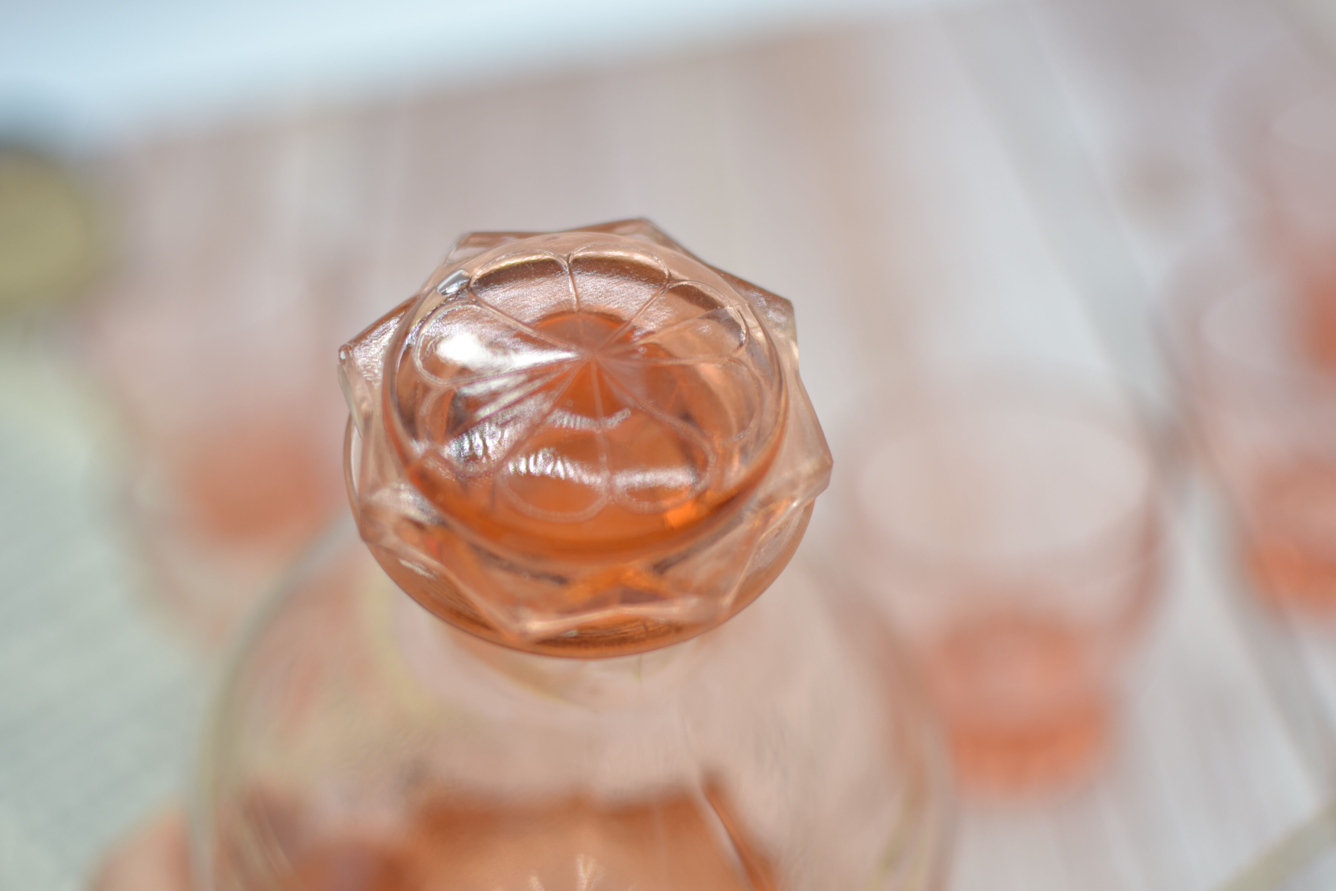 Vintage pink decanter with its 6 glasses