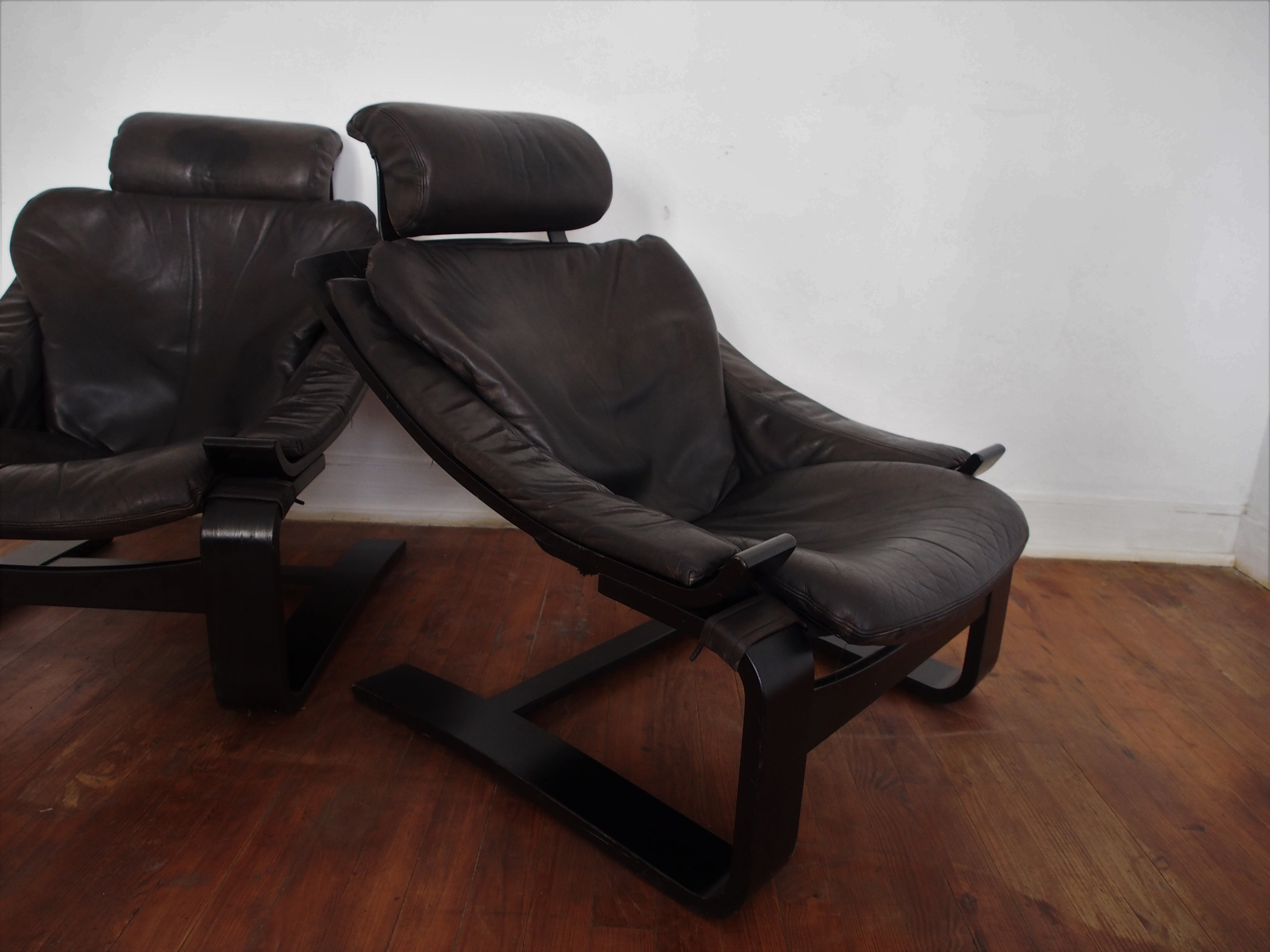 Pair of Scandinavian armchairs and footrests