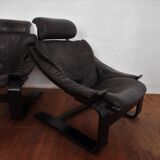 Paire de fauteuils et reposes pieds scandinaves