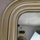 Antique Louis-Philippe style gilded patinated mirror