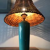 Enamelled ceramic lamp and rattan