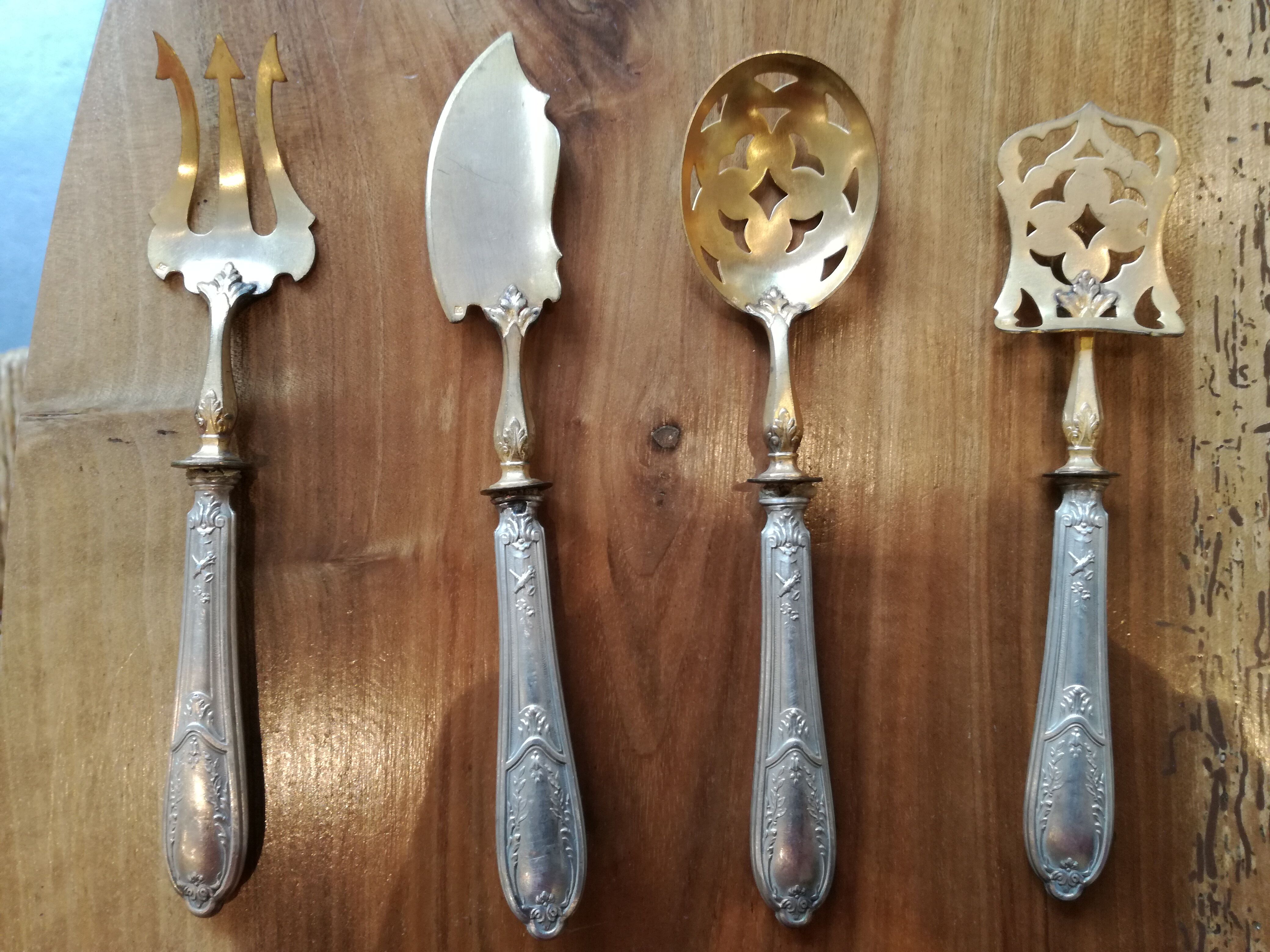 Cutlery with mignardises Late nineteenth silver and vermeil