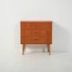 Scandinavian Chest of Drawers in teak with turned birch legs, 1950s